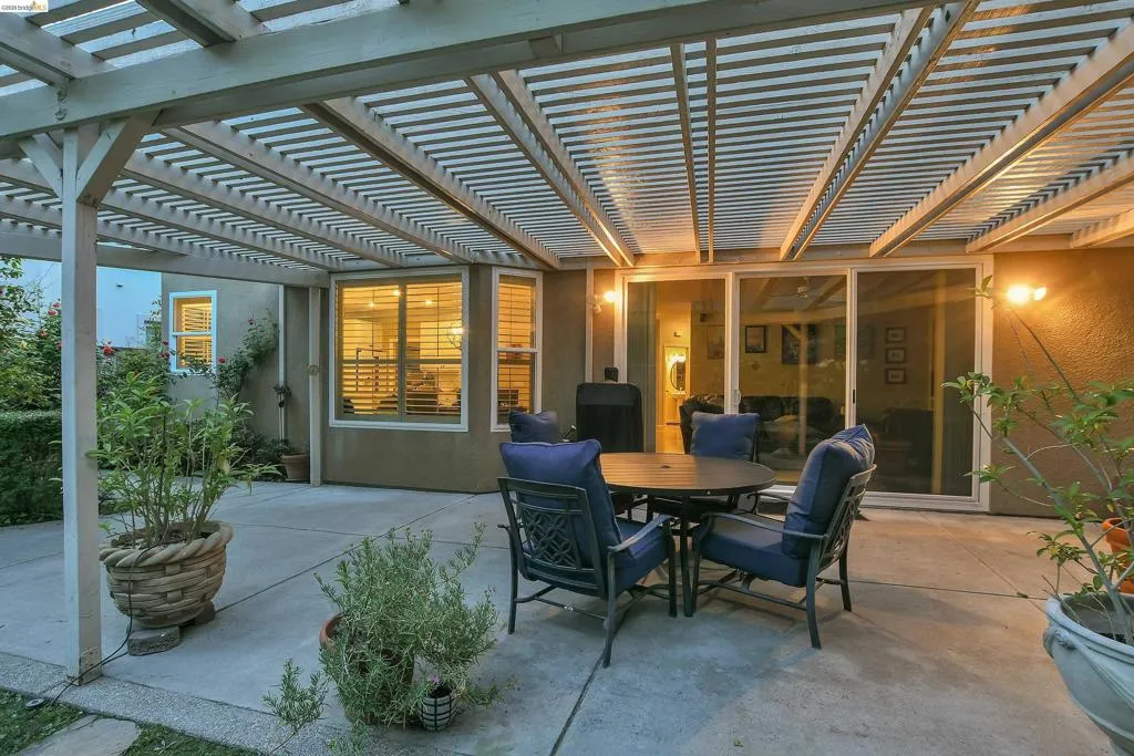 View of patio featuring a pergola and outdoor dining space
