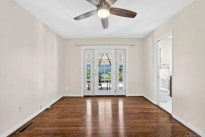 Primary bedroom with french doors to the exterior!