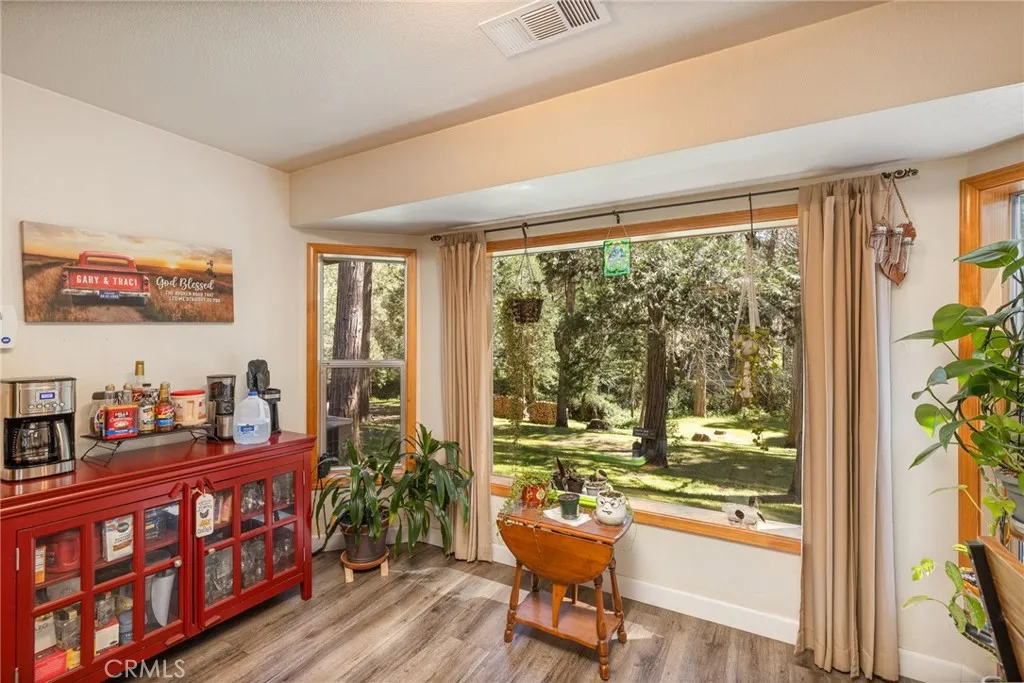 breakfast nook area with backyard view