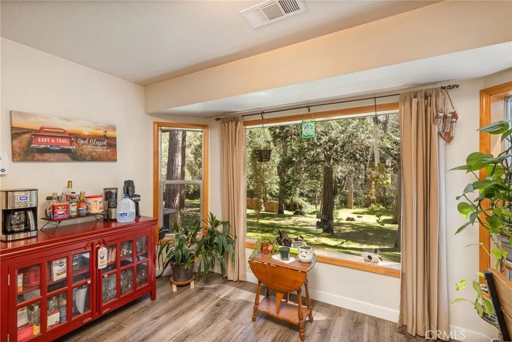 breakfast nook area with backyard view