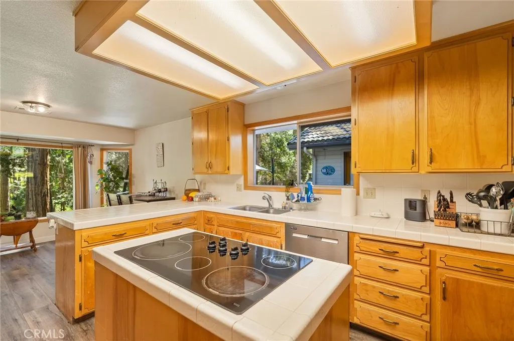 kitchen window view of exterior deck