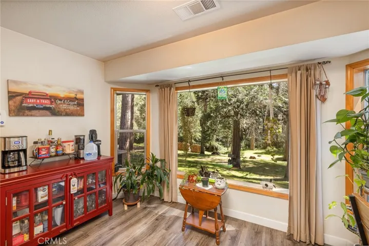 breakfast nook area with backyard view
