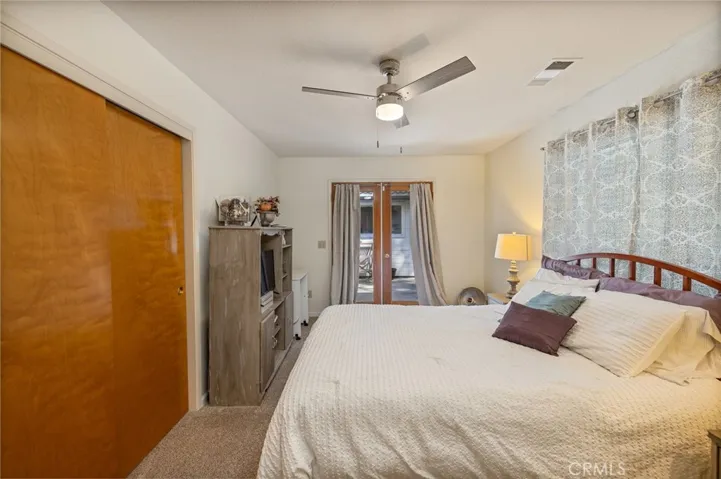 guest bedroom has slider to deck