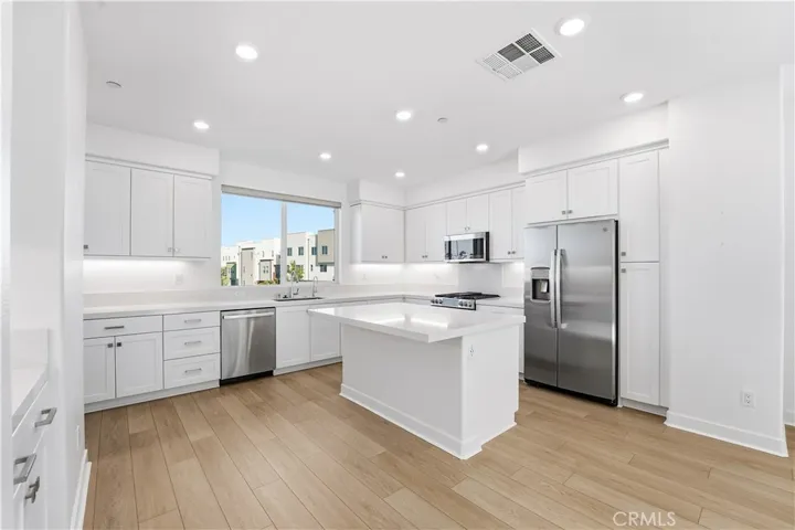 ANOTHER VIEW OF KITCHEN WITH WALKIN PANTRY