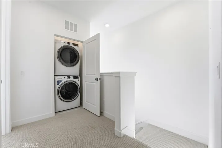 UPSTAIRS LAUNDRY AREA NEXT TO MASTER.