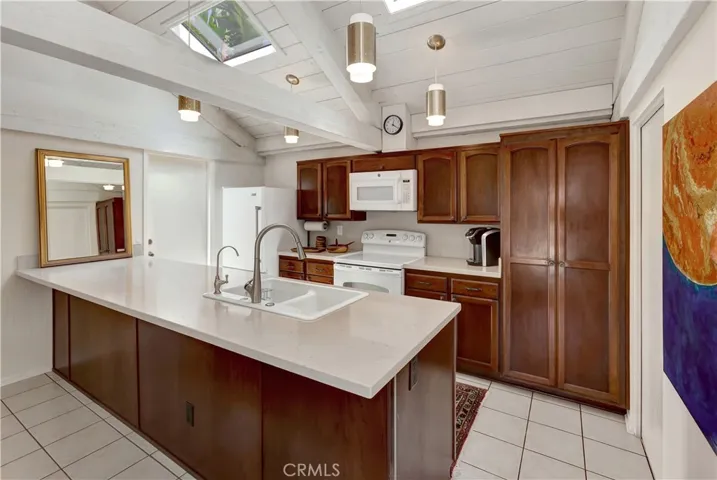 Open kitchen with direct access to garage.