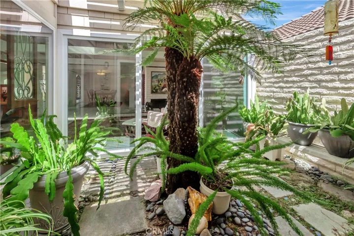 Open Atrium creating a peaceful indoor-outdoor feel.