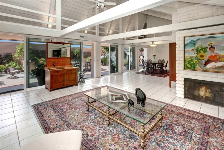 Open living and dining area filled with natural light and an easy indoor-outdoor feel.