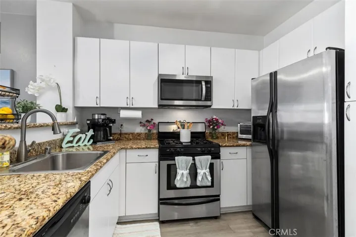 Kitchen with stainless steel appliances and granite countertops