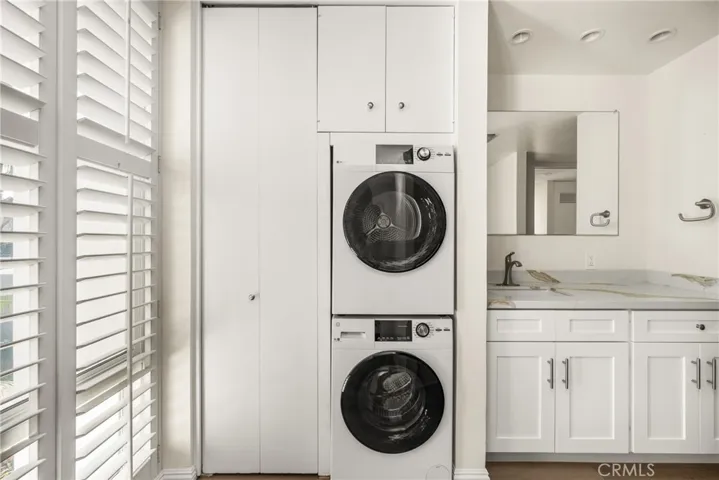 Laundry in the primary bathroom.
