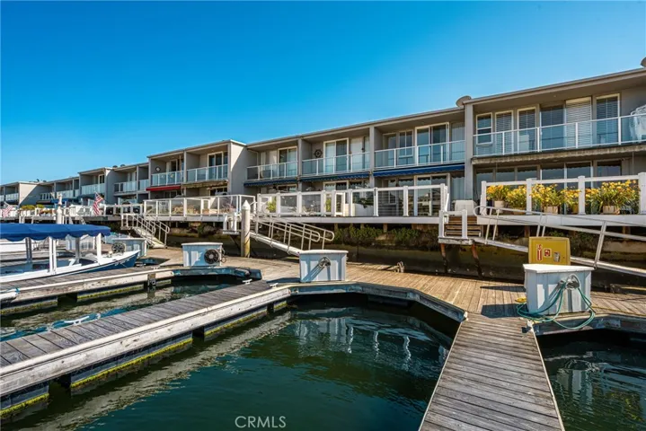 Waterfront living in Huntington Harbour with your own 30' dock.