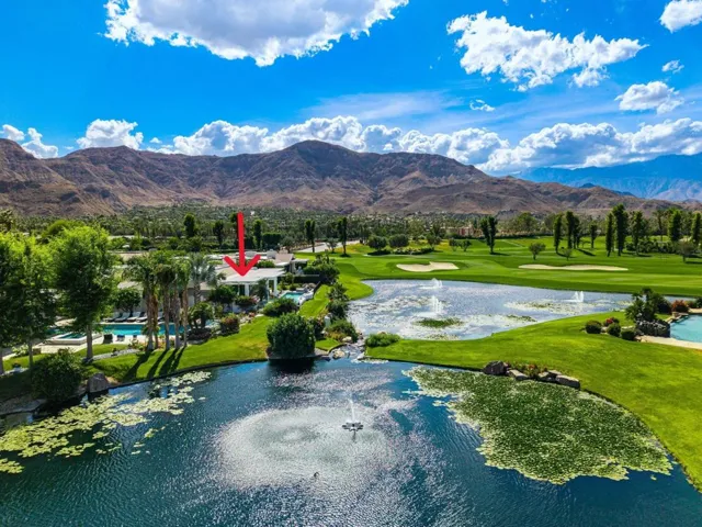 Home overlooks lagoon & golf course