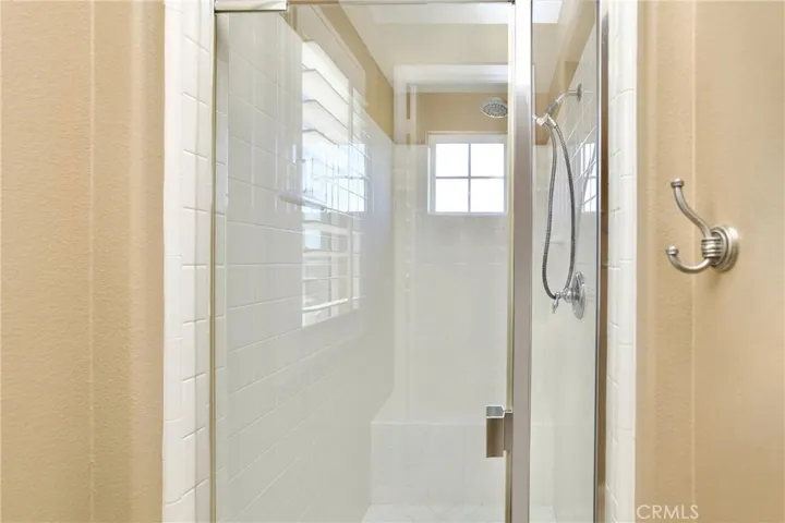 large step in shower in primary bathroom