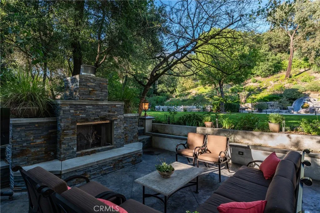 Outdoor fireplace with seating area