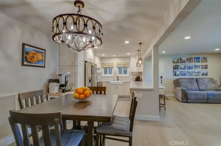 Dining area into kitchen and living area
