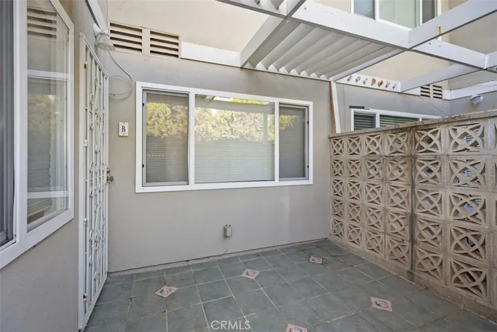 Rare, private, enclosed entry and patio to the Master bedroom.