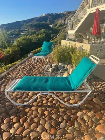 Chaise lounges to admire the view from the first floor common area sun deck, just steps from the lanai.