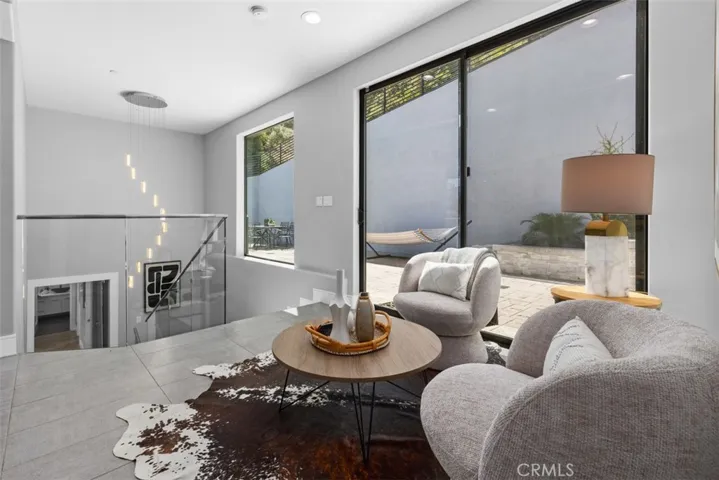  This cozy sitting area with large sliding doors to the backyard patio.