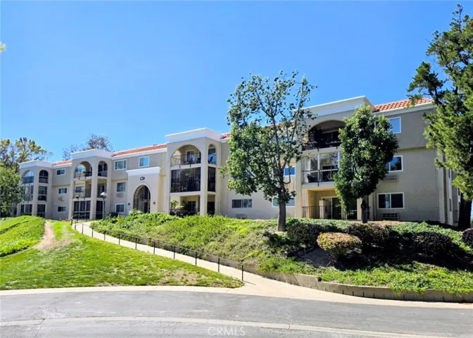 4011-1F CALLE SONORA OESTE FACING EAST. GROUND FLOOR CONDO IN CENTER