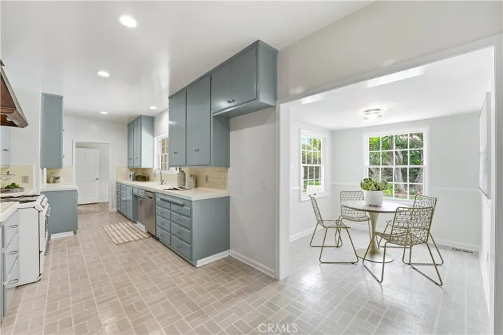 Kitchen view looking onto breakfast nook.