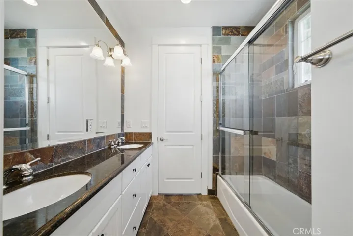 1 st level Jack & Jill Bath bath on entry level