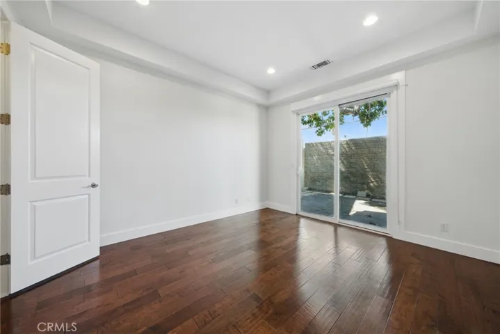 2nd Br on 1st level with walk in closet and access to Jack & Jill bath and private rear yard.