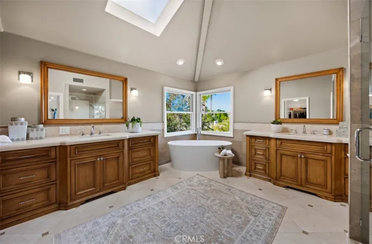 Updated primary bath with freestanding soaking tub