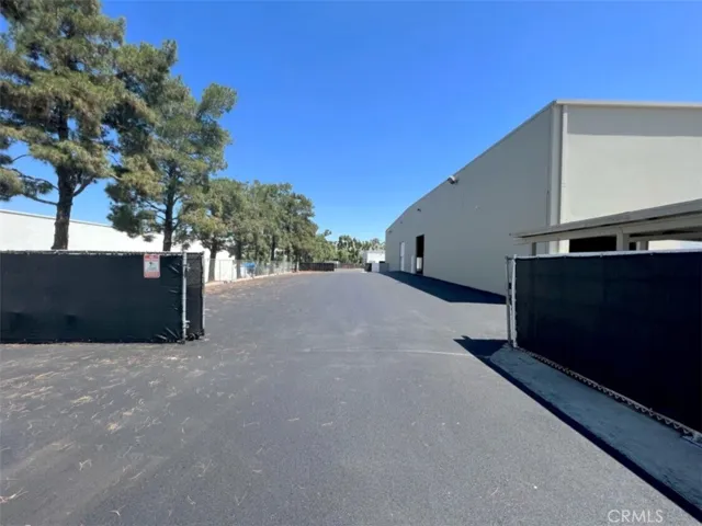 Gated, Paved and Fenced Rear Yard