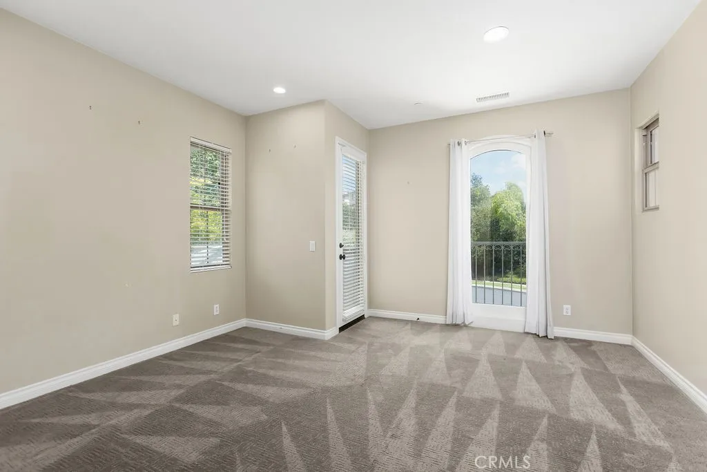 Front guest room has a balcony.