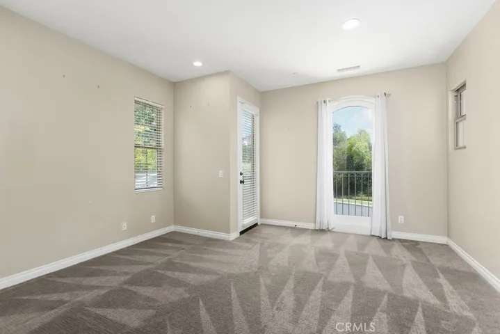 Front guest room has a balcony.