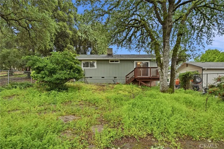 Looking at house from backyard.