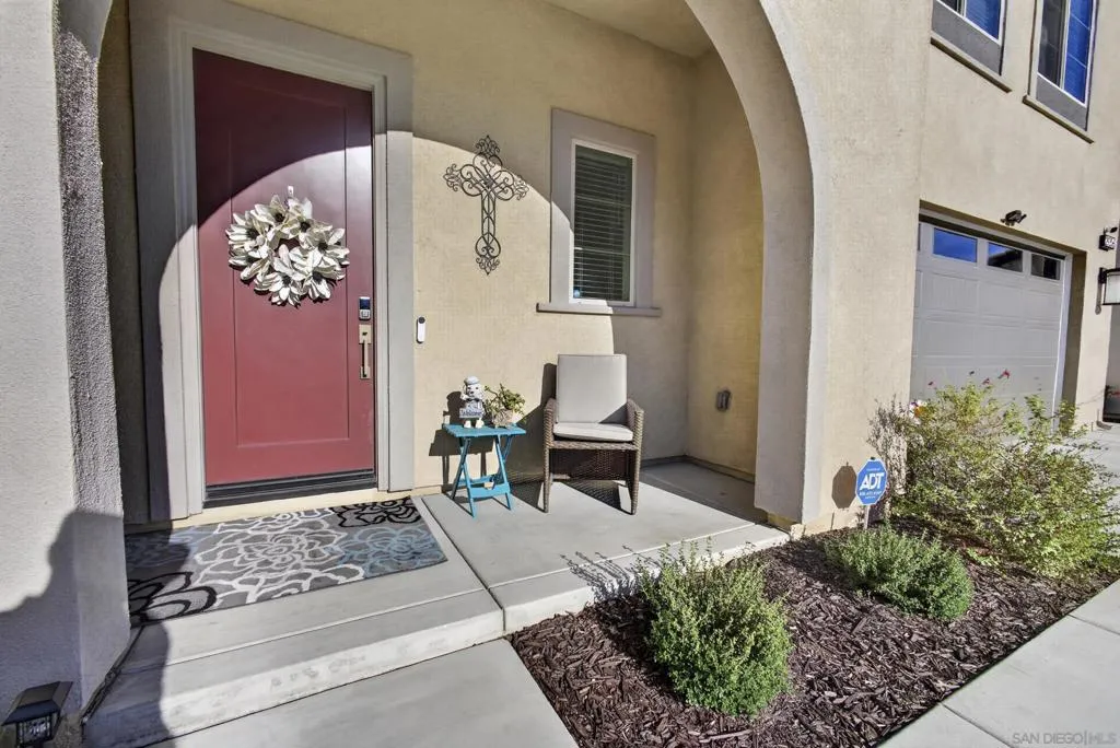 Main Residence entry with covered entry porch