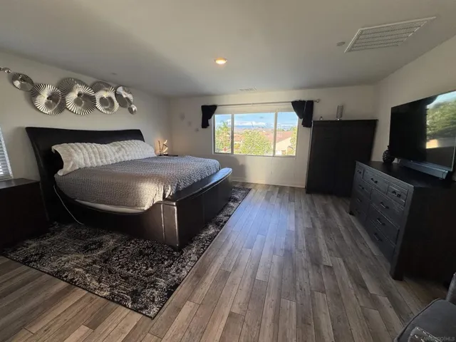 Main Residence bedroom with dual closets, Spa shower, dual vanity
