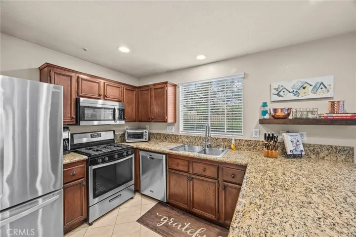 Granite countertop and breakfast bar.