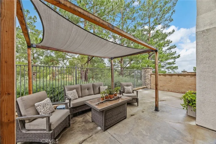 Spacious back patio with golf course views.