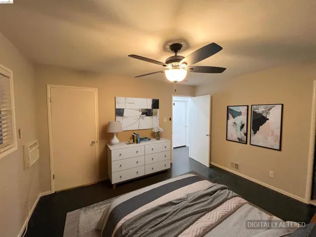 Bedroom featuring baseboards and a ceiling fan