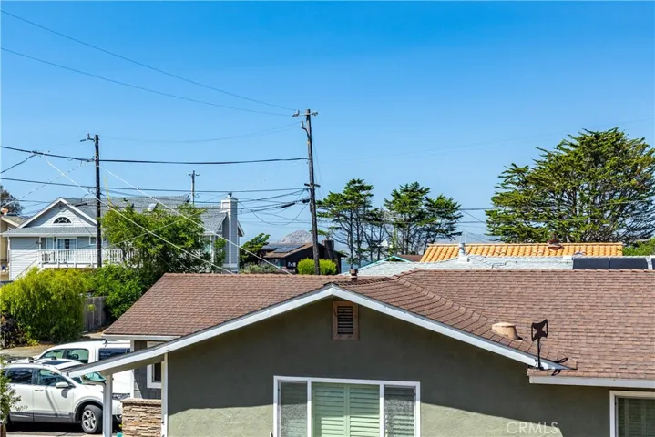 Peak of Morro Rock from backyard patio.