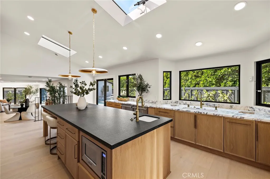 Double dishwashers, two sinks, and microwave