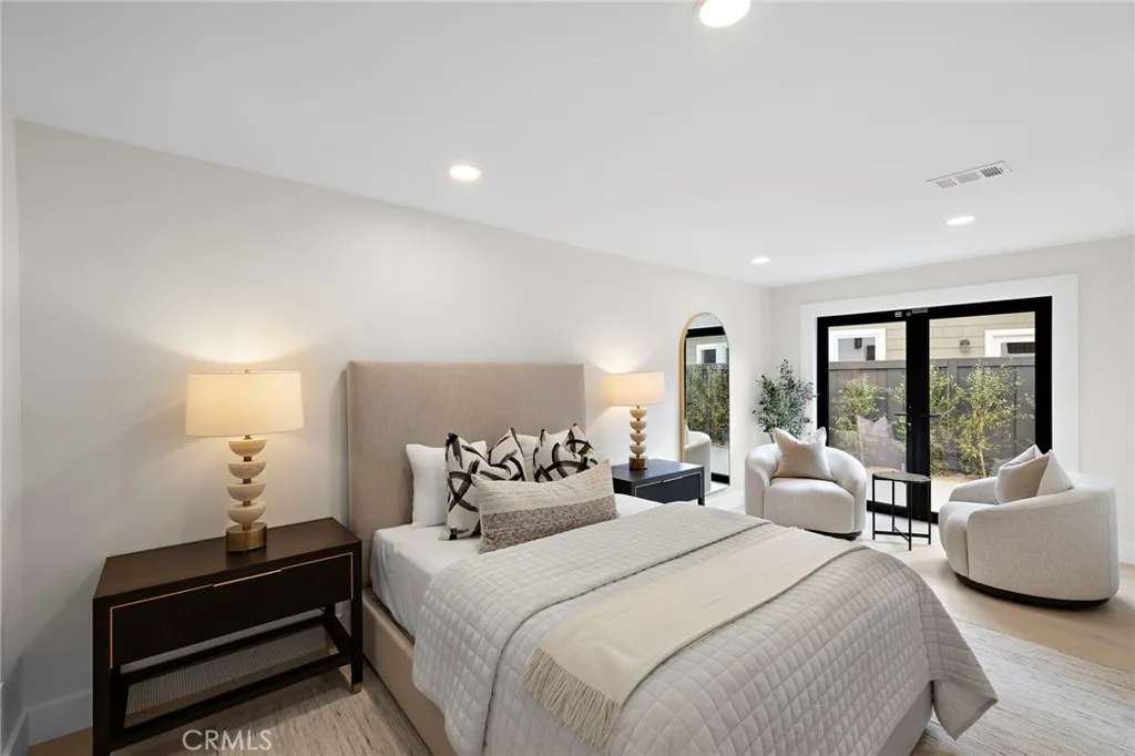 First floor bedroom with private entry, full bath and walk in shower.