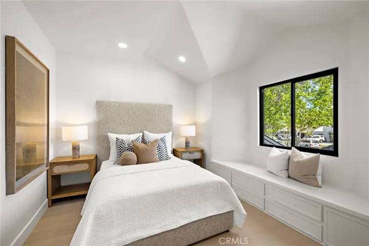 Large front bedroom with reading and storage bench and large closet