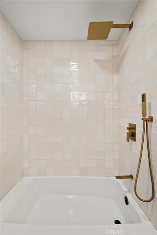 Upstairs Full shower/tub in hall bath