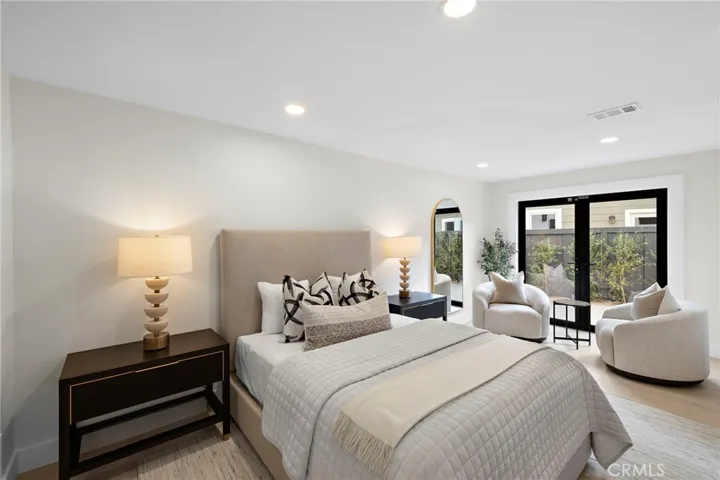 First floor bedroom with private entry, full bath and walk in shower.
