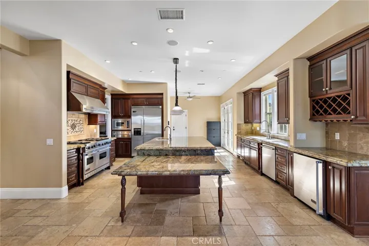 Beautiful, large kitchen with a Viking double oven gas range.