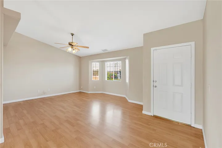 Entry way and Living Room with laminate flooring.