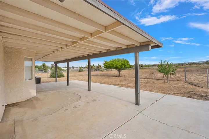 Back patio with gated yard