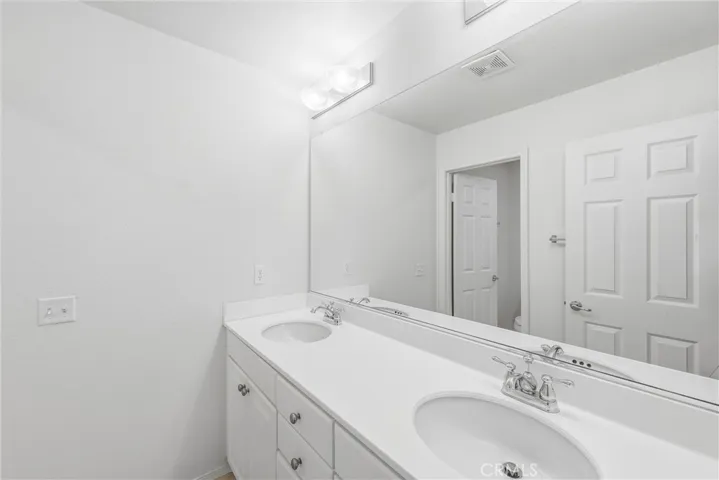 Dual vanity with seprate shower/tub area