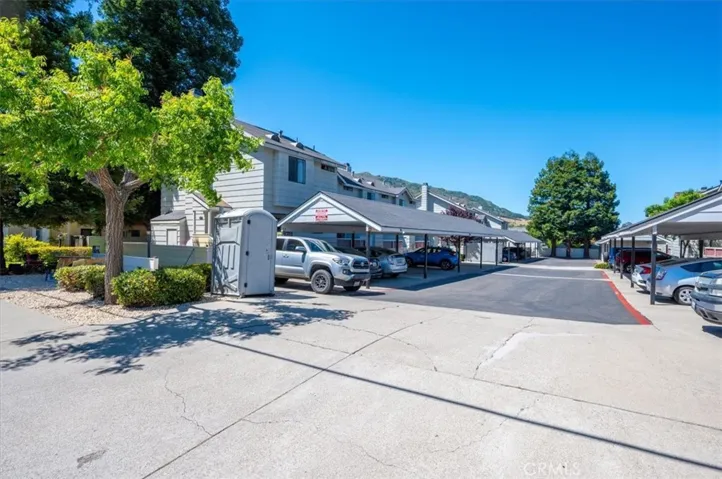 Complex Entrance, 2-3 open Guest Parking Spots.