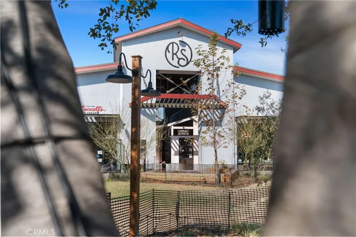 The iconic River Street hub, blending modern design with rustic charm, home to curated dining and boutique experiences.