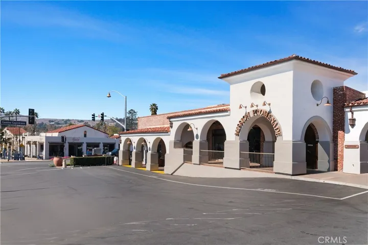 Charming Mission Promenade just minutes away, offering a collection of boutique shops, dining, and local conveniences in a beautifully designed Spanish-style setting.