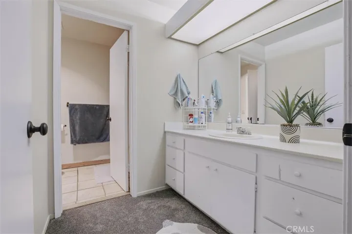 Upstairs sink/vanity area for secondary bedroom upstairs.